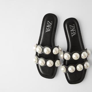 black flat shoes with pearls
