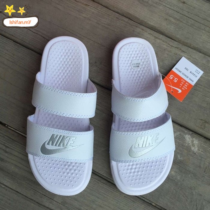 white two strap nike sandals