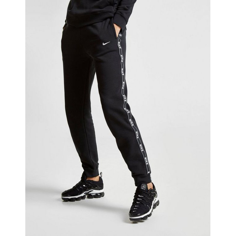 nike black tape joggers