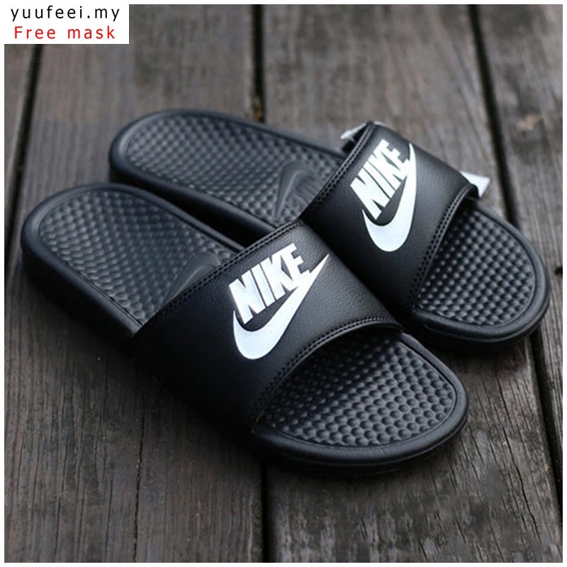 nike slippers black and gold