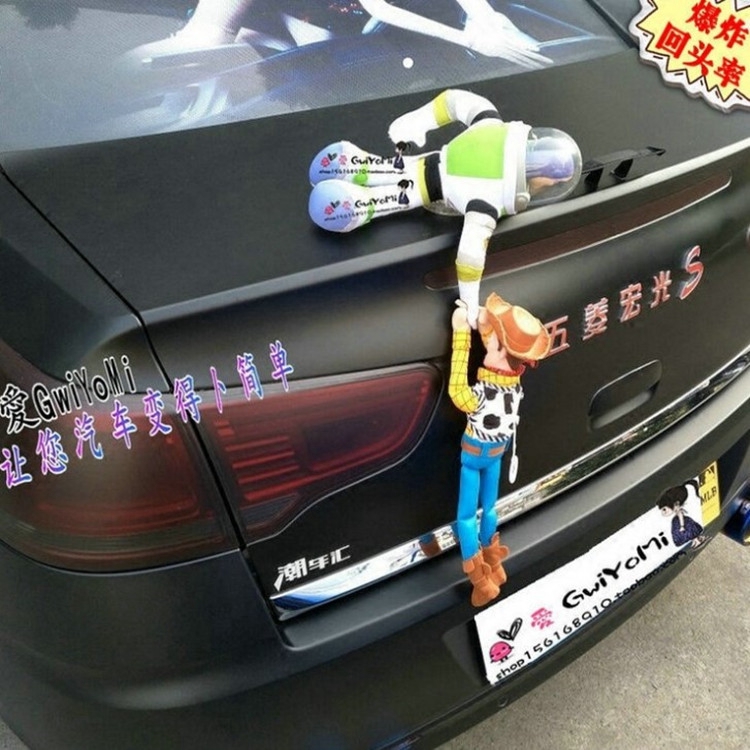 buzz and woody on car