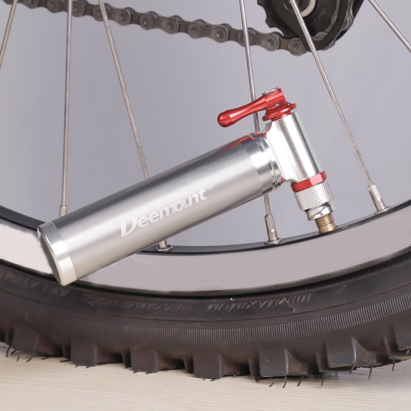 how to pump a bike tire with a ball pump