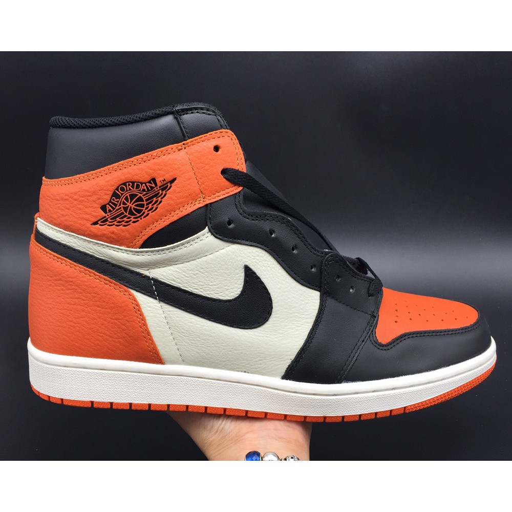 orange black white air jordan 1