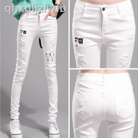 white ripped jeans womens