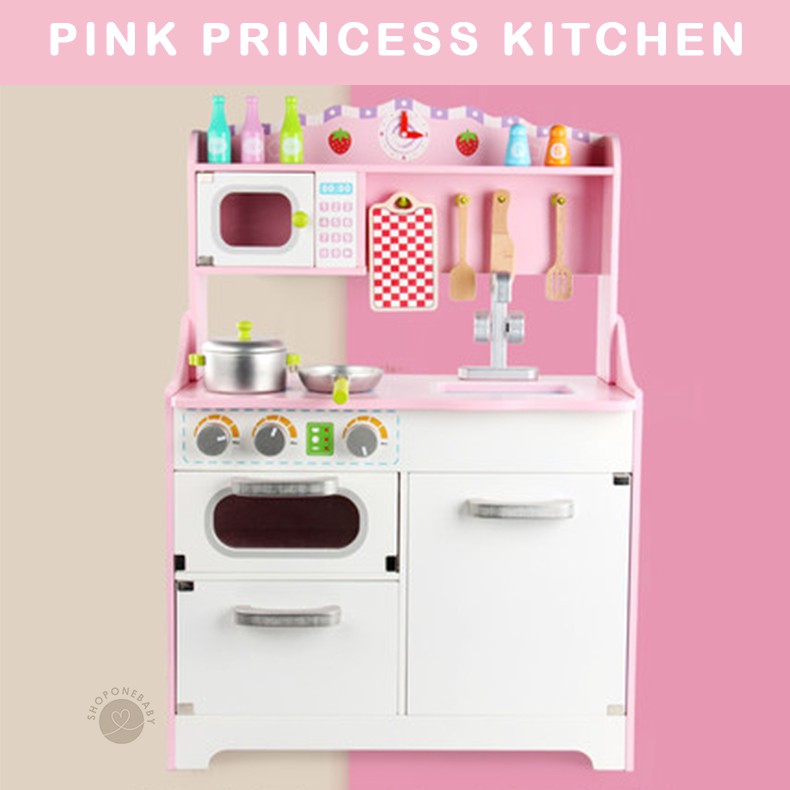 pink wooden kitchen and cooking set