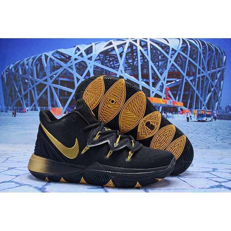 kyrie irving black and gold shoes