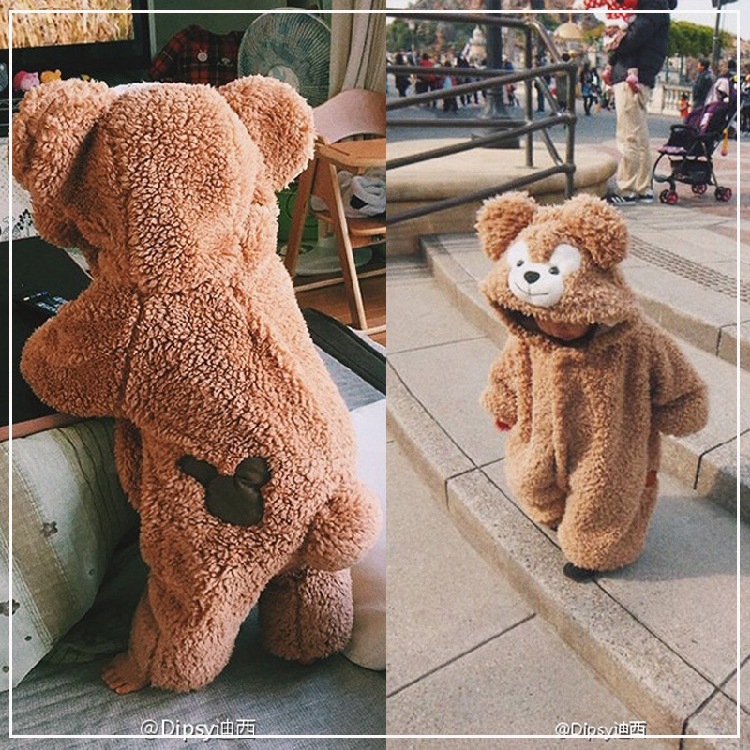 teddy bear with baby clothes