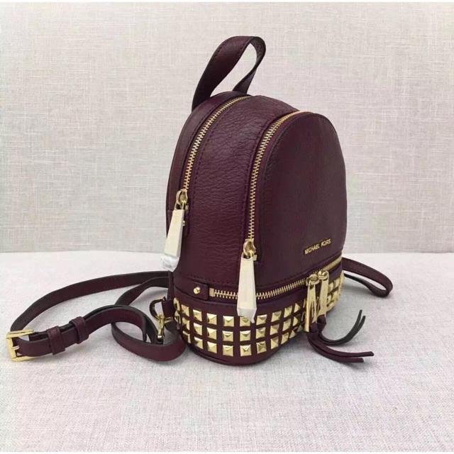 mk rhea studded backpack