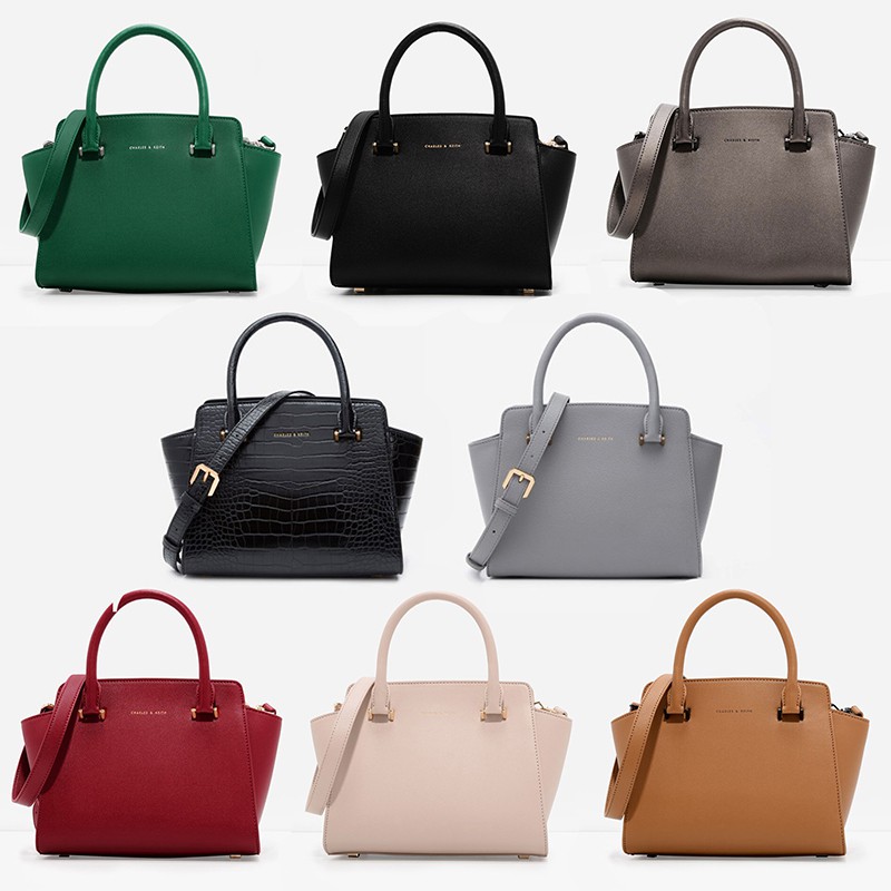 top handle trapeze bag