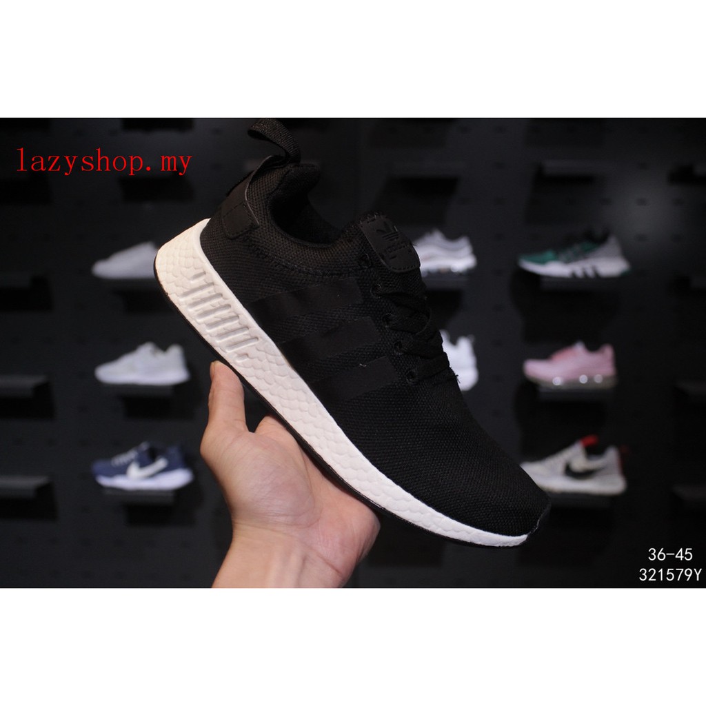 nmd r2 black on feet