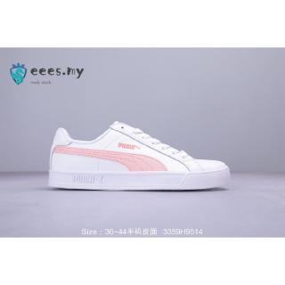 white and pink puma shoes