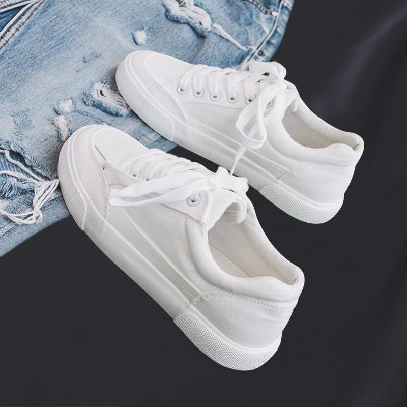 white cloth sneakers