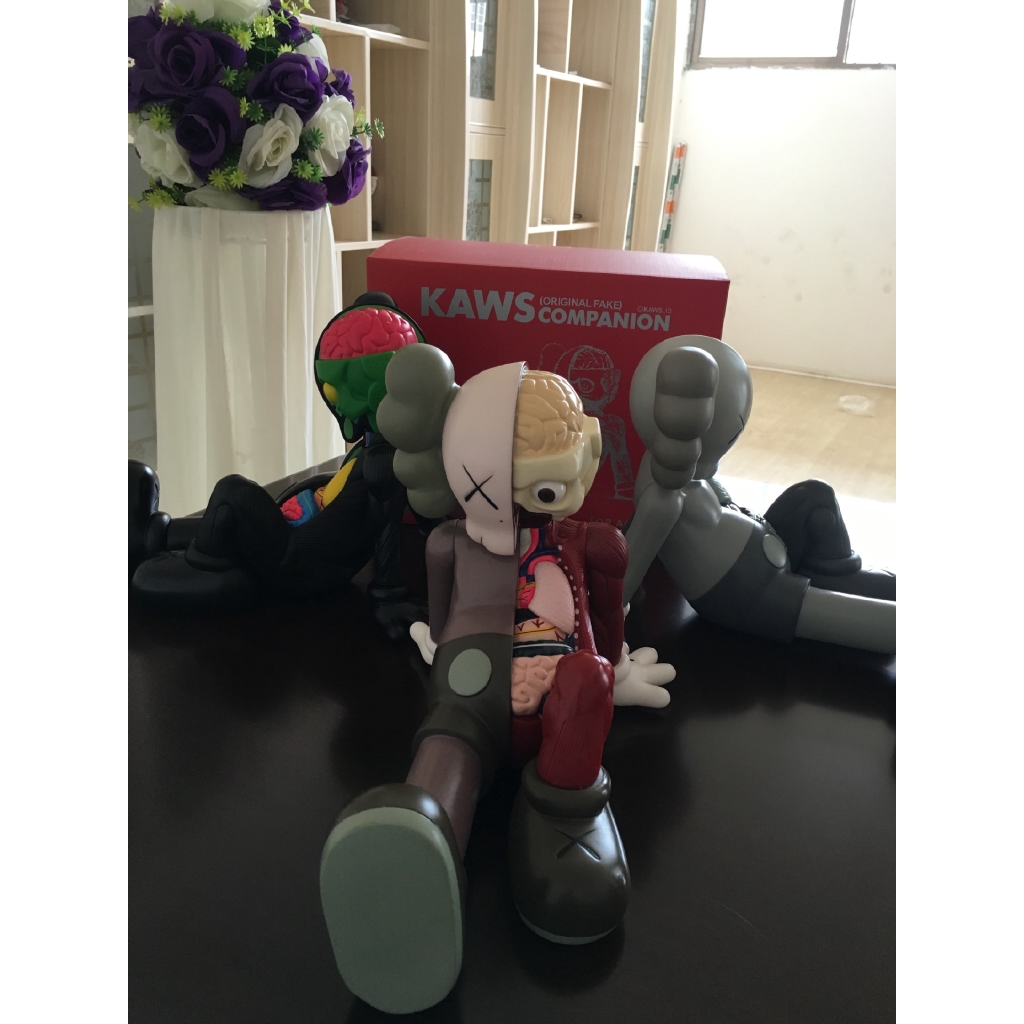 fake kaws doll