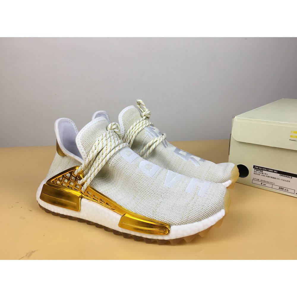 adidas pharrell nmd gold