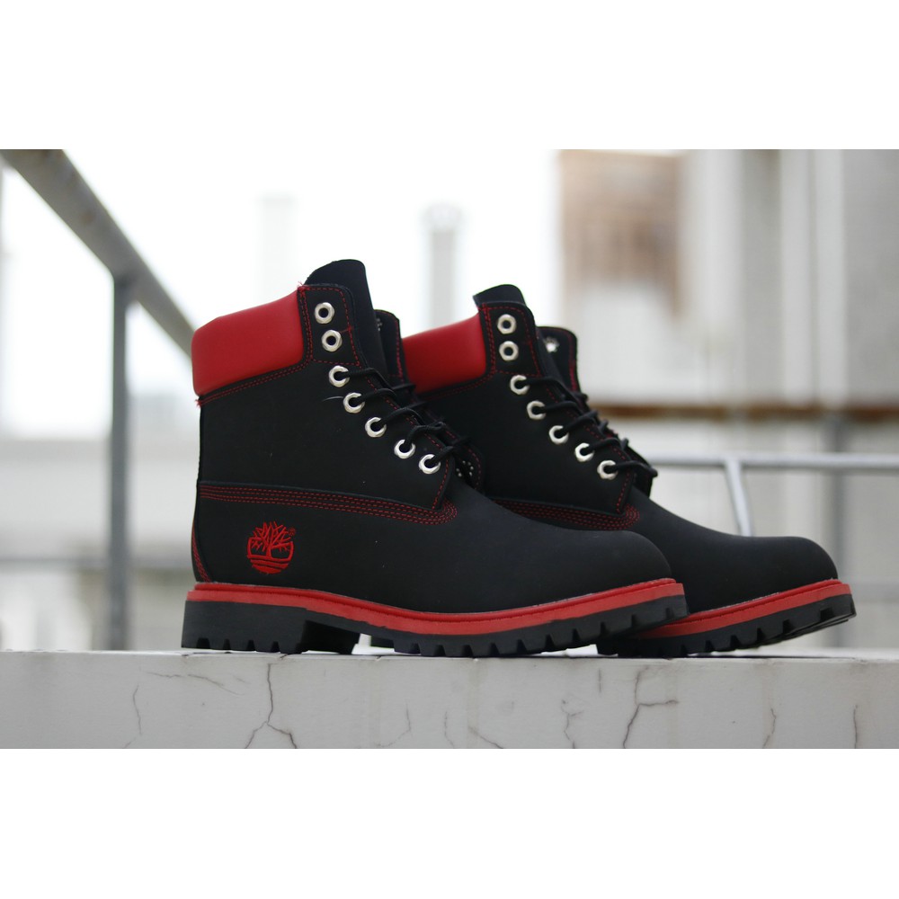 red and black timberland boots