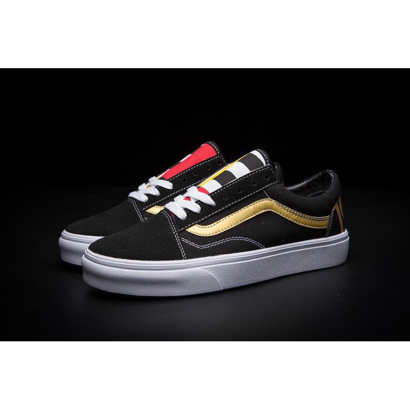 black and gold vans