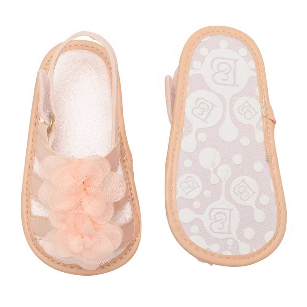 light pink baby shoes