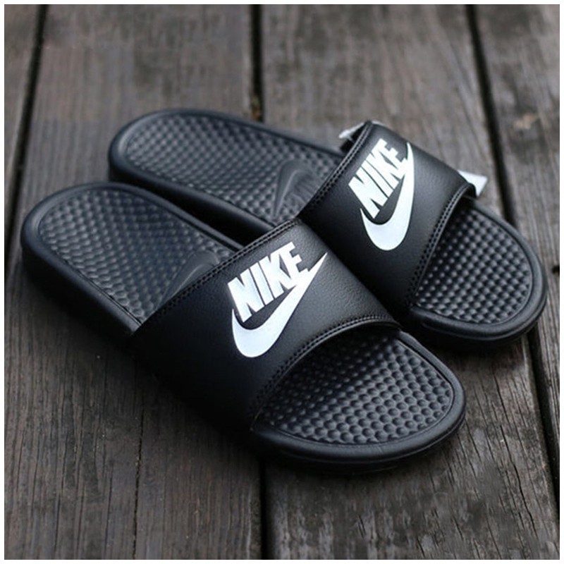 womens grey nike flip flops