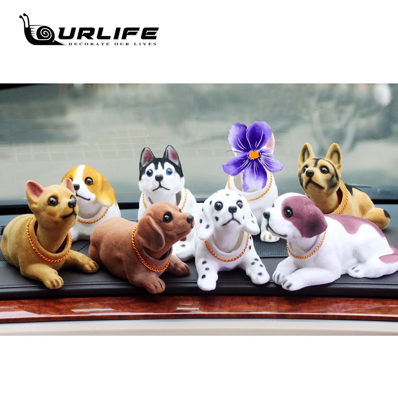 car dashboard toys dog