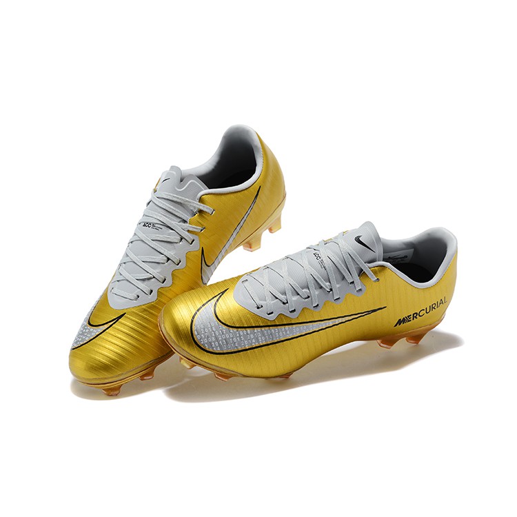 gold football boots