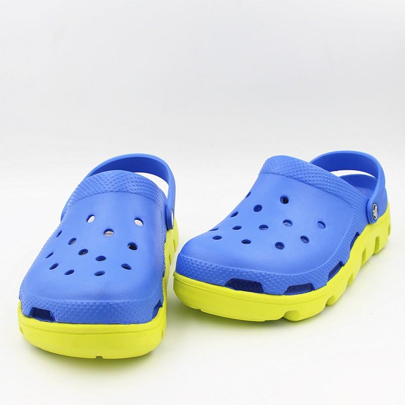 yellow and blue crocs