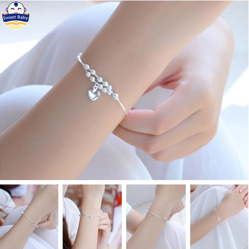 thin silver bracelet with charm