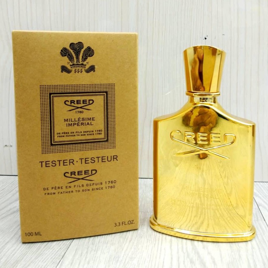 creed perfume gold bottle