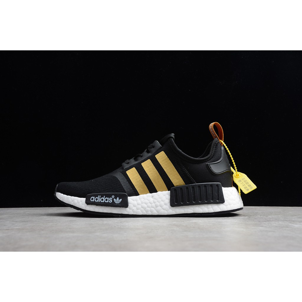 nmd black and yellow