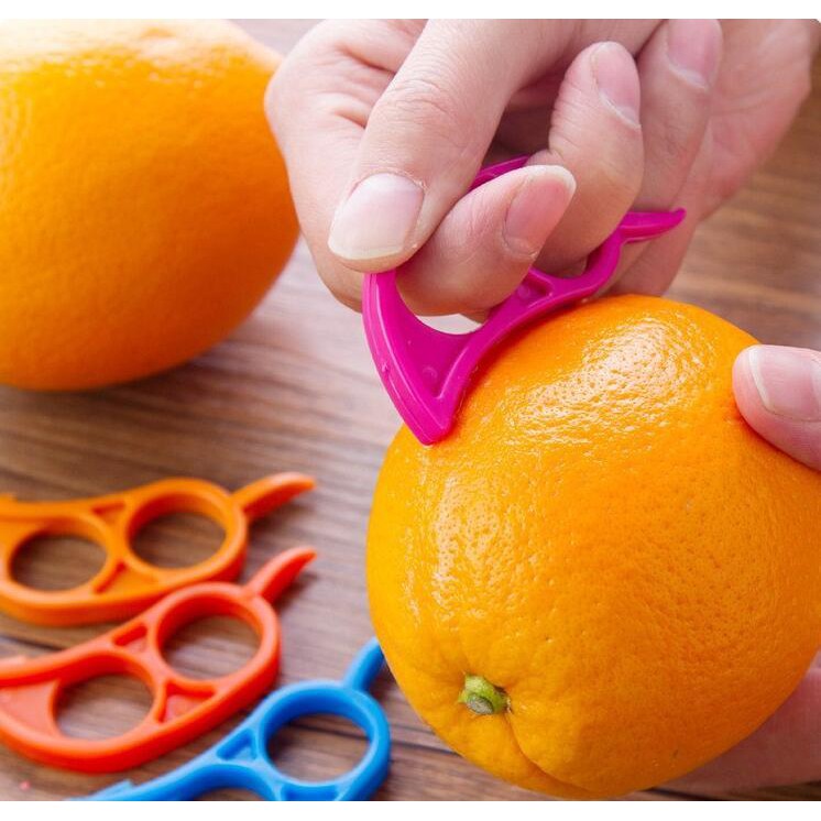 orange fruit peeler