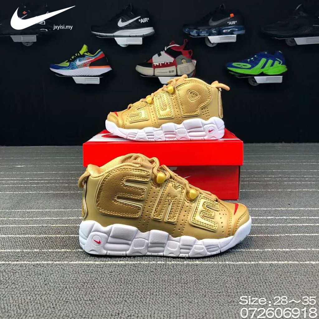 boys gold nike shoes