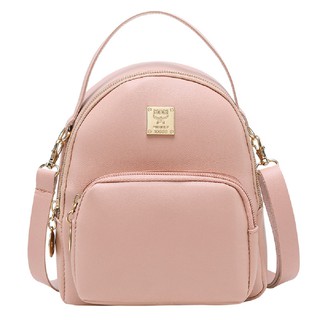 small pink backpack purse