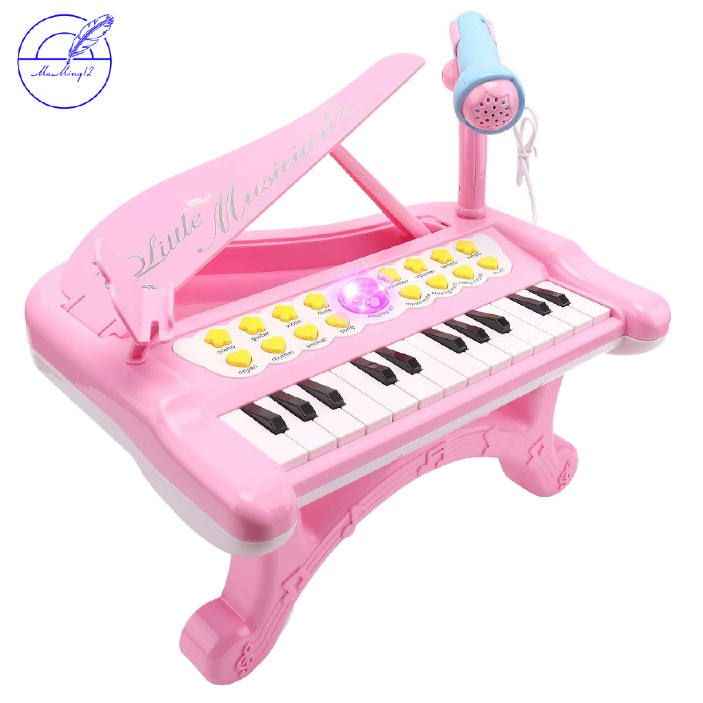 pink toy piano with microphone