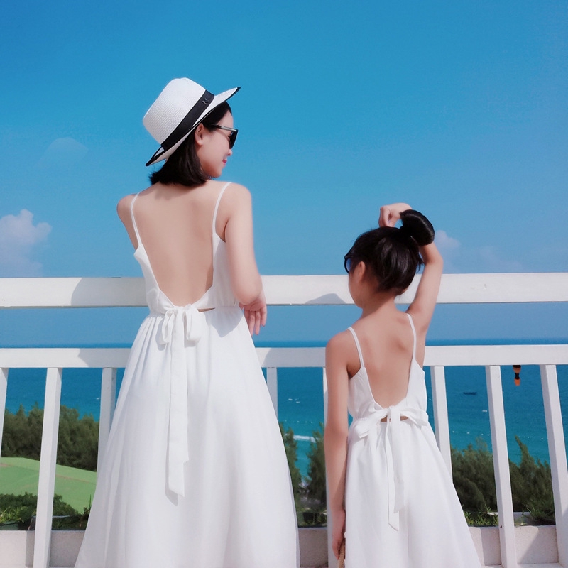 white dress mom and daughter