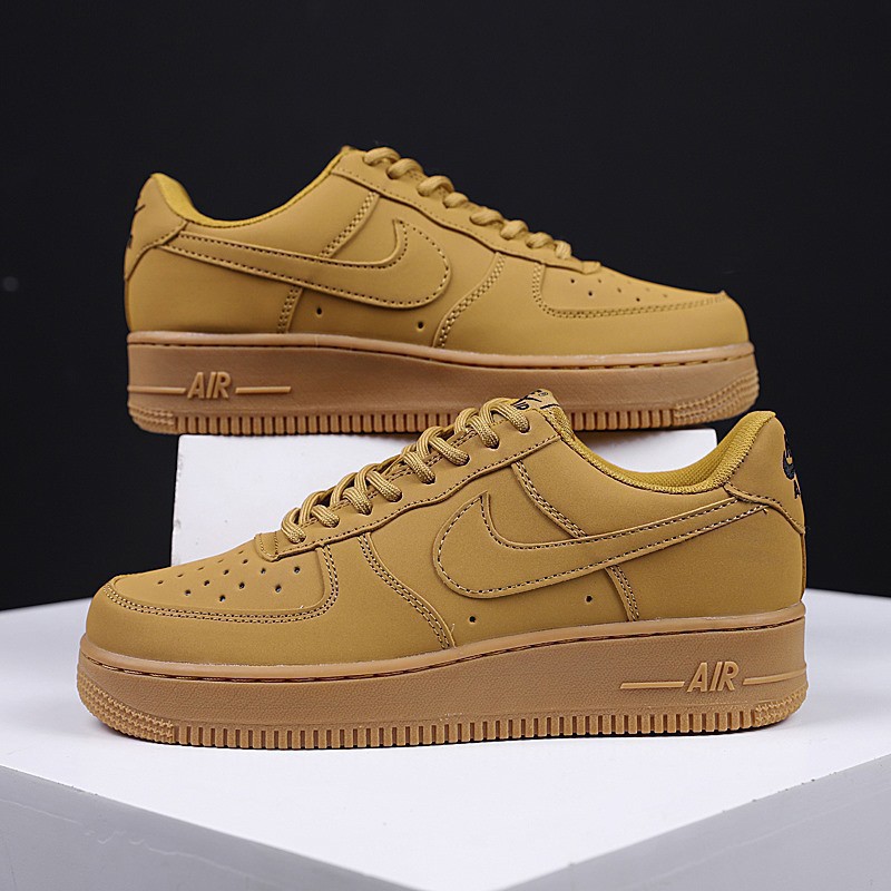 nike air force with gold tick