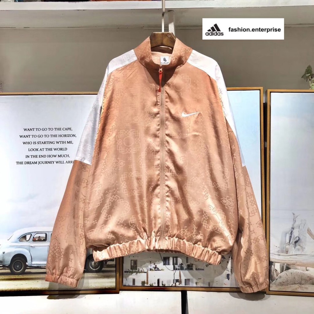 nike rose gold track jacket