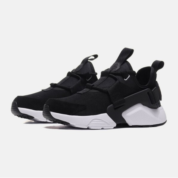 black huaraches with white bottom