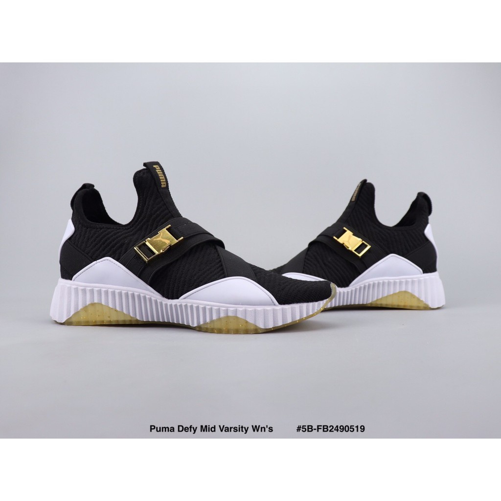 black and gold puma high tops
