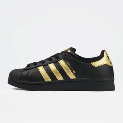 black superstars with gold stripes