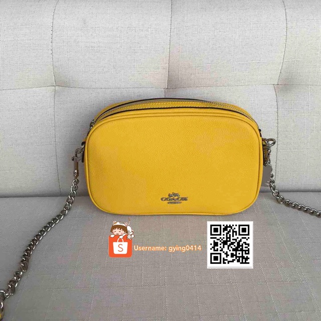 coach yellow sling bag