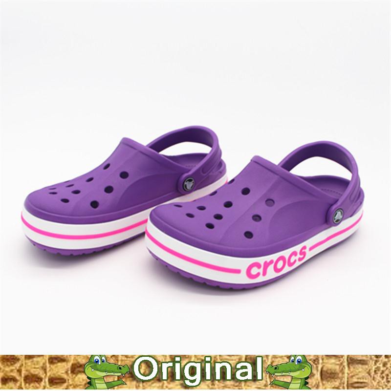 purple and gold crocs