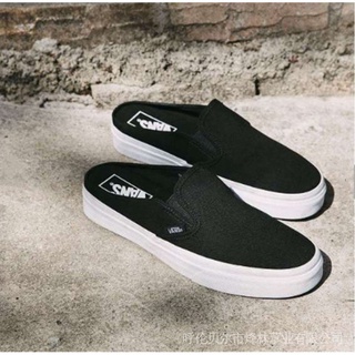 half black and white vans slip ons