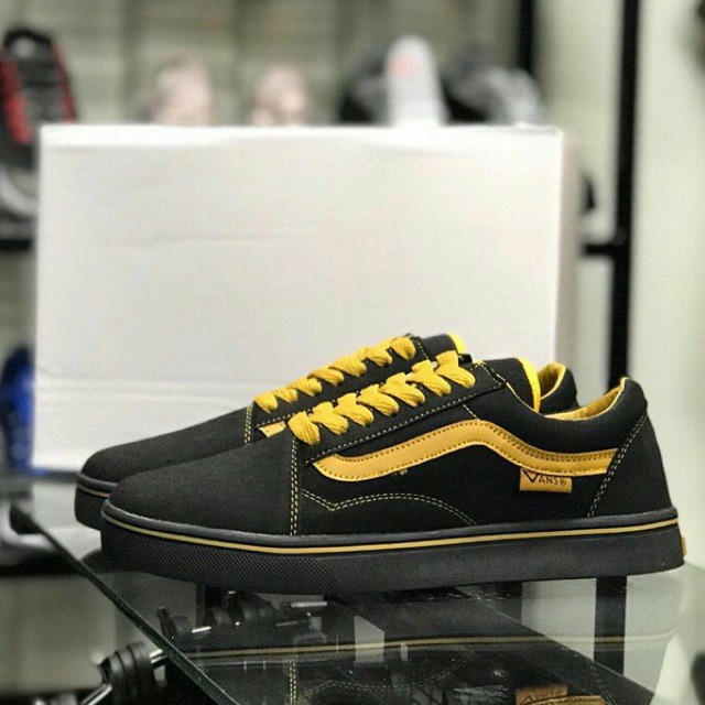 yellow black vans old skool