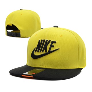 black and yellow nike hat