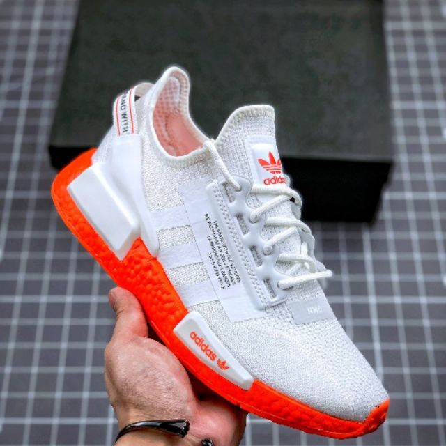 white and orange nmd