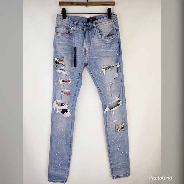 amiri jeans with patches