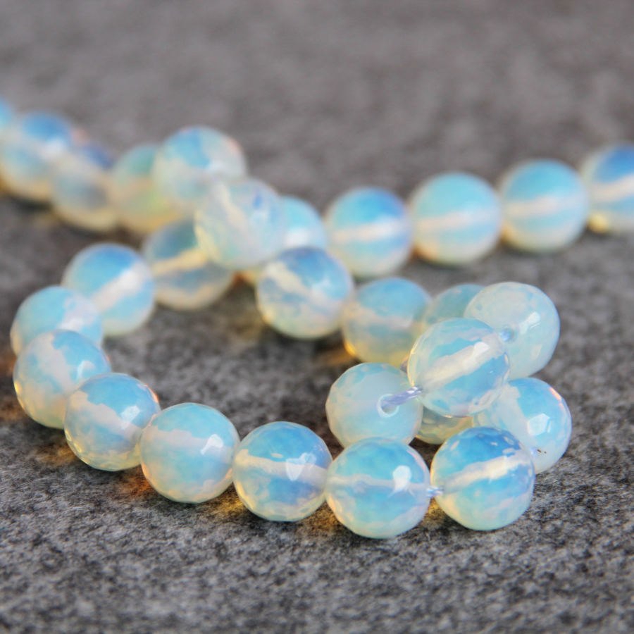 15 /" The 10mm Sri Lanka opal heart shaped beads