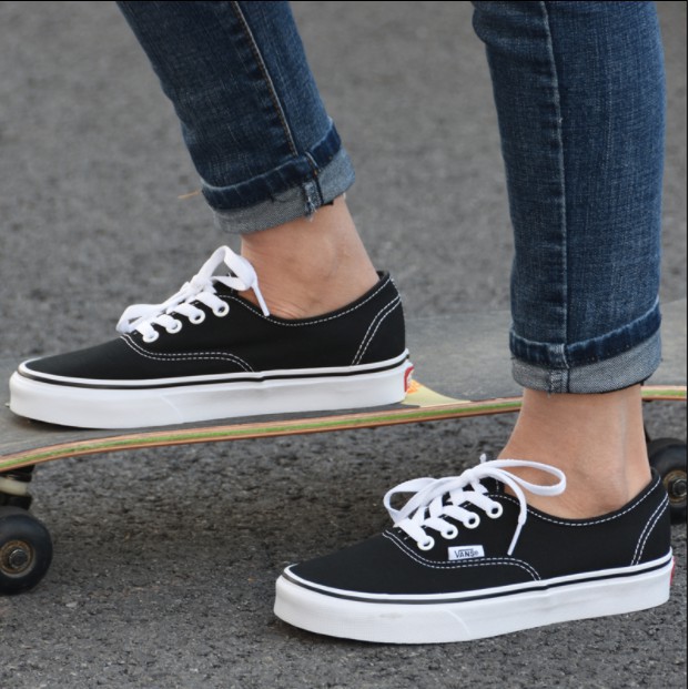 black and white low cut vans