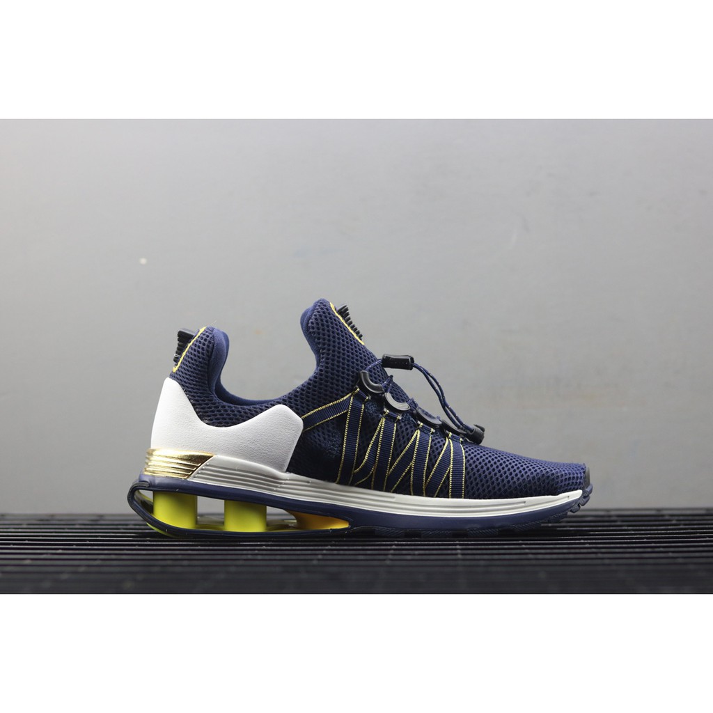 nike shox gravity midnight navy metallic gold
