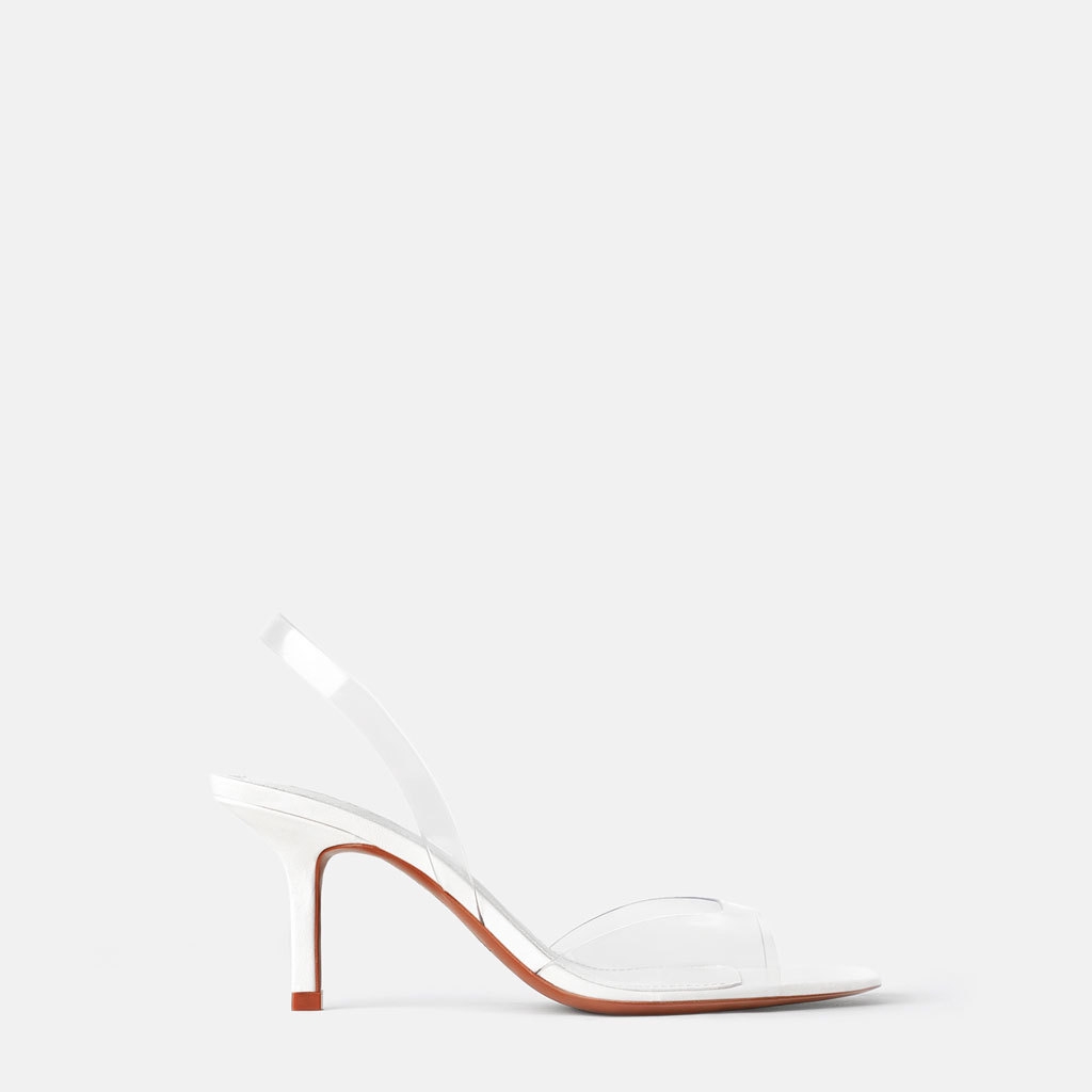 white plastic sandals
