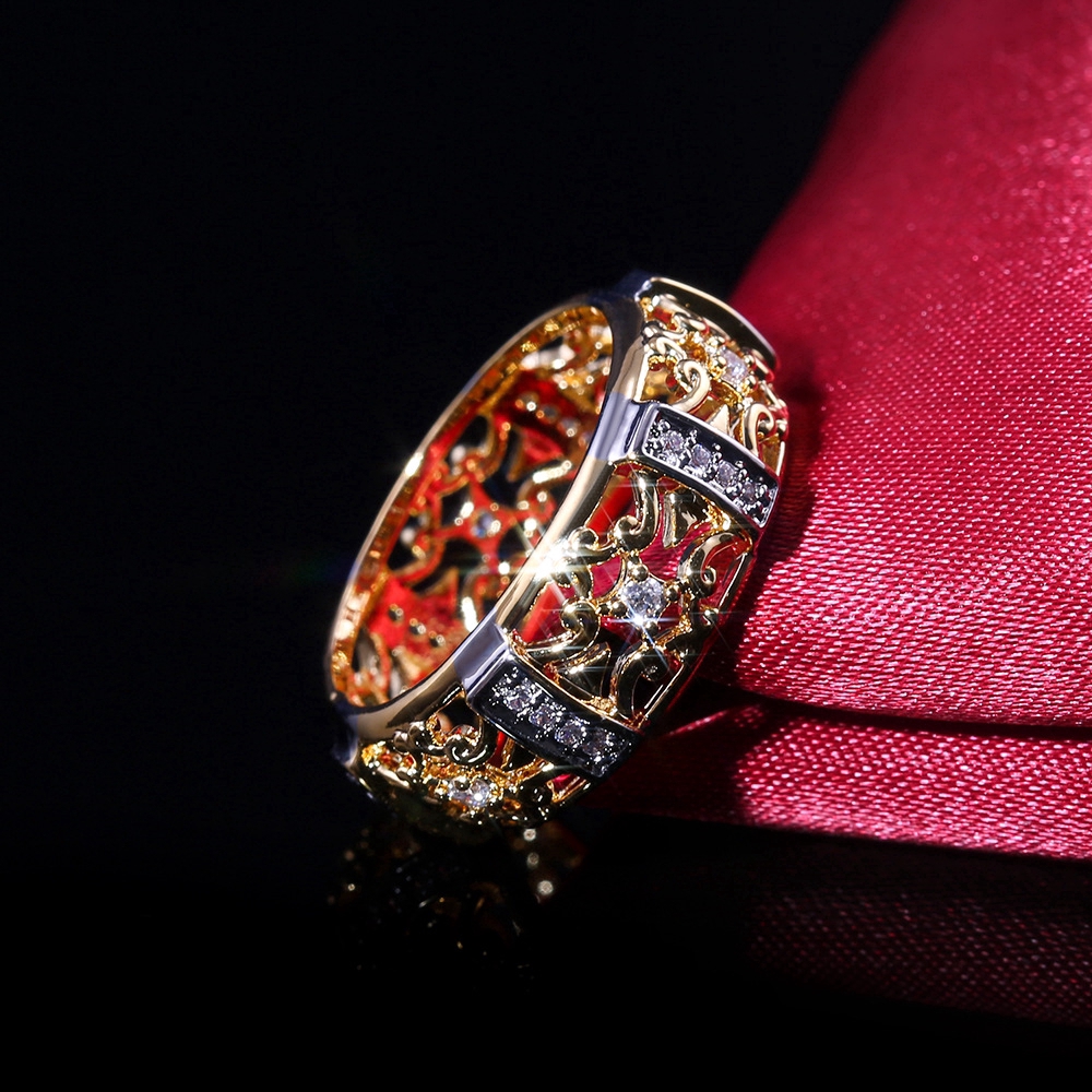 Anello vintage a fiore con zircone in oro antico intagliato_voghion.com